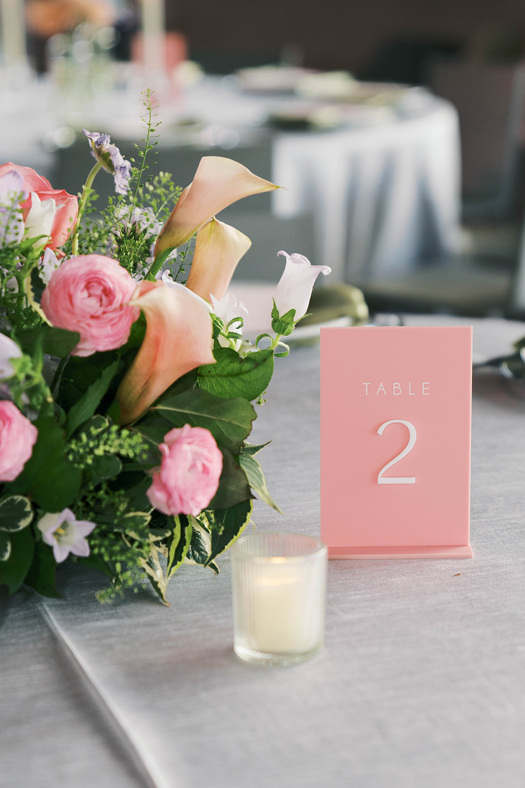 Perot Museum wedding bright centerpiece pink peach lavender
